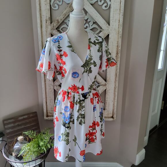 Runway Paris Women's Faux Wrap Surplice Mini A-Line Dress in Floral - Picture 1 of 14